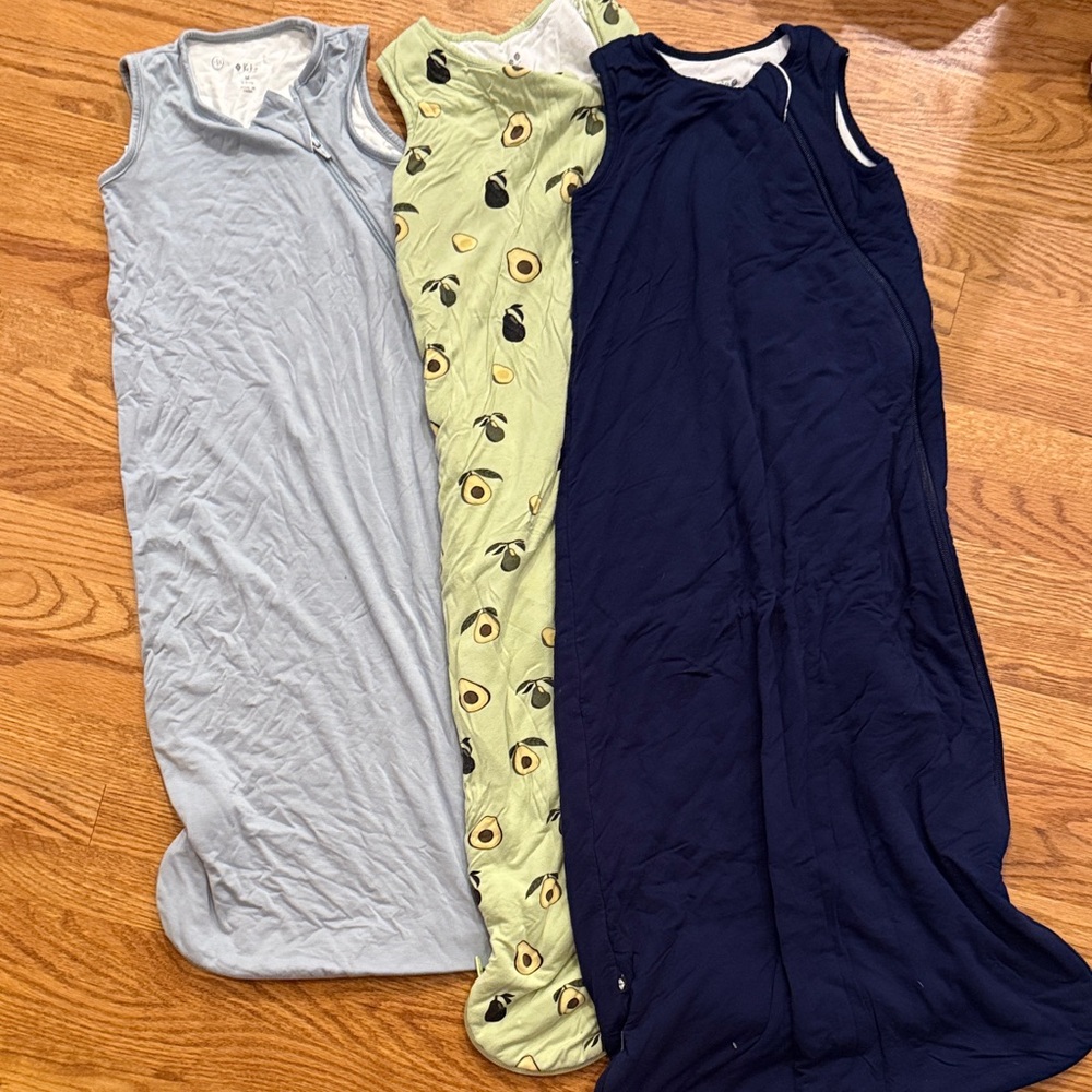 Three Kyte BABY Sleep Sacks - light blue, navy blue, avocado